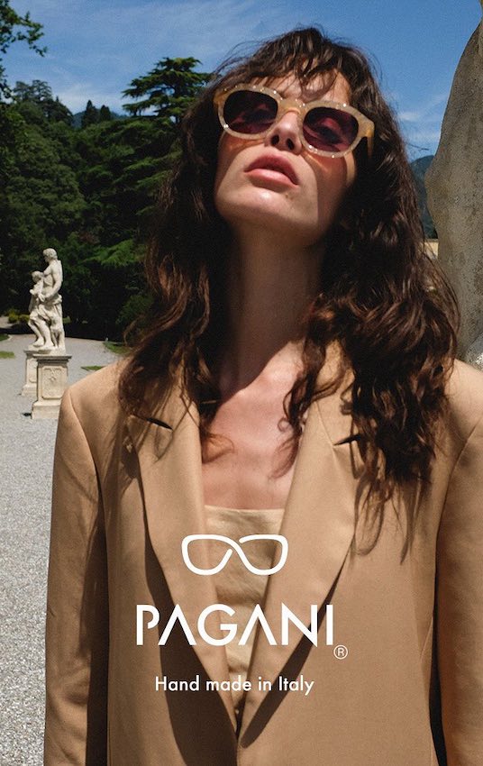 Lady in a beige suit wearing Angelo sunglasses from Pagani