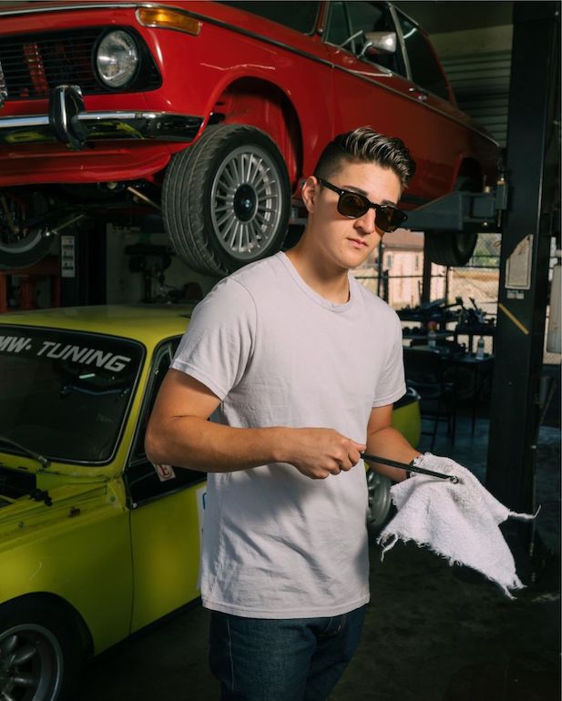 Young male mechanic wearing Salt Coolidge sunglasses